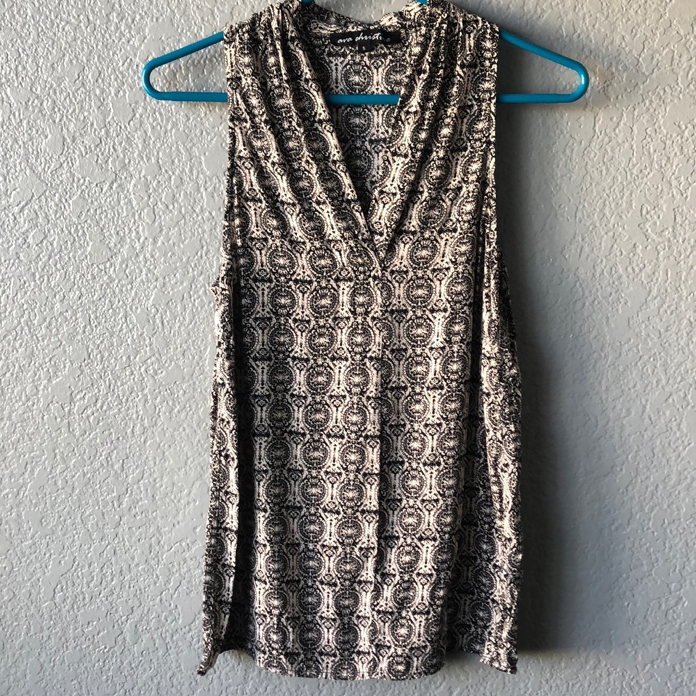 Small, Black and cream tank.